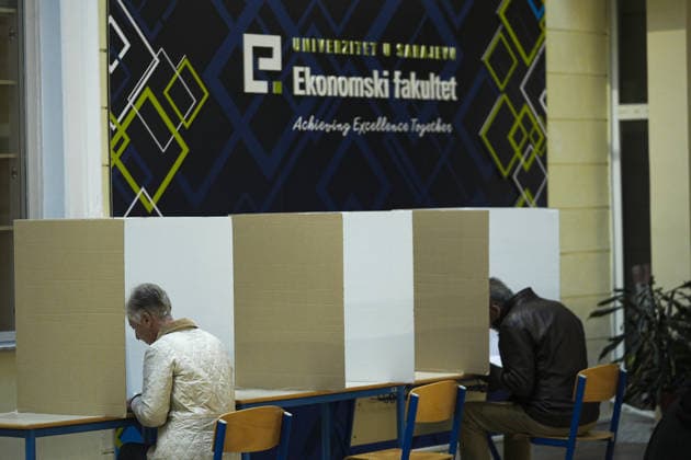Voters cast ballots in Sarajevo as Bosnia and Herzegovina holds general elections SARAJEVO, BOSNIA AND HERZEGOVINA - OCTOBER 04: Voters cast their ballots as polling stations open for the 2026 General Elections in Sarajevo, Bosnia and Herzegovina on October 04, 2026. The nationwide vote features the inaugural use of new electoral technologies, including biometric voter identification, optical ballot scanners, and automated result transmission systems. Citizens are voting to elect members of the tripartite Presidency of Bosnia and Herzegovina, deputies to the Parliamentary Assembly, the Federation of BiH Parliament, the President and Vice Presidents of Republika Srpska, the National Assembly of Republika Srpska, and cantonal assemblies. Sami Copyright: x2026xAnadoluxSamirxJordamovicx