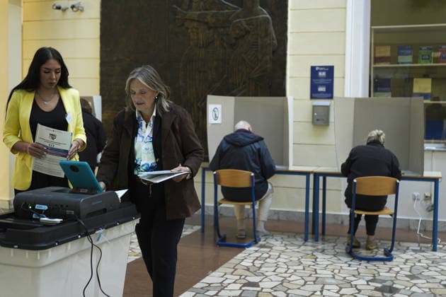 Voters cast ballots in Sarajevo as Bosnia and Herzegovina holds general elections SARAJEVO, BOSNIA AND HERZEGOVINA - OCTOBER 04: Voters cast their ballots as polling stations open for the 2026 General Elections in Sarajevo, Bosnia and Herzegovina on October 04, 2026. The nationwide vote features the inaugural use of new electoral technologies, including biometric voter identification, optical ballot scanners, and automated result transmission systems. Citizens are voting to elect members of the tripartite Presidency of Bosnia and Herzegovina, deputies to the Parliamentary Assembly, the Federation of BiH Parliament, the President and Vice Presidents of Republika Srpska, the National Assembly of Republika Srpska, and cantonal assemblies. Sami Copyright: x2026xAnadoluxSamirxJordamovicx