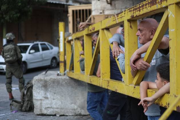 October 4, 2026, Hebron, Palestine, State of: HEBRON, OCCUPIED WEST BANK, OCTOBER 4, 2026: Newly installed Israeli military gates are seen near entrances to Hebron s Old City as Israeli forces impose additional movement restrictions in the area. One of the new iron gates was installed in the Al-Zahid area, a key route connecting neighborhoods of the Old City and providing access toward the Ibrahimi Mosque. Local shop owner Badr al-Tamimi said the restrictions were affecting access to more than 1,000 commercial shops and over 500 homes in the area. Hebron Palestine, State of - ZUMAq101 20261004_zna_q101_064 Copyright: xMosabxShawerx