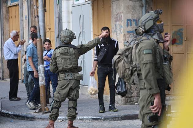 October 4, 2026, Hebron, Palestine, State of: HEBRON, OCCUPIED WEST BANK, OCTOBER 4, 2026: Newly installed Israeli military gates are seen near entrances to Hebron s Old City as Israeli forces impose additional movement restrictions in the area. One of the new iron gates was installed in the Al-Zahid area, a key route connecting neighborhoods of the Old City and providing access toward the Ibrahimi Mosque. Local shop owner Badr al-Tamimi said the restrictions were affecting access to more than 1,000 commercial shops and over 500 homes in the area. Hebron Palestine, State of - ZUMAq101 20261004_zna_q101_073 Copyright: xMosabxShawerx