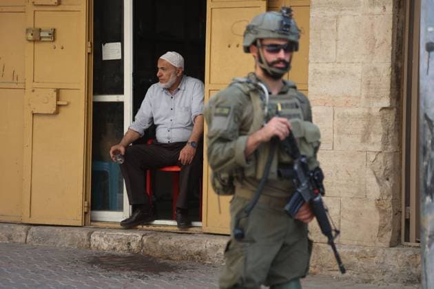 October 4, 2026, Hebron, Palestine, State of: HEBRON, OCCUPIED WEST BANK, OCTOBER 4, 2026: Newly installed Israeli military gates are seen near entrances to Hebron s Old City as Israeli forces impose additional movement restrictions in the area. One of the new iron gates was installed in the Al-Zahid area, a key route connecting neighborhoods of the Old City and providing access toward the Ibrahimi Mosque. Local shop owner Badr al-Tamimi said the restrictions were affecting access to more than 1,000 commercial shops and over 500 homes in the area. Hebron Palestine, State of - ZUMAq101 20261004_zna_q101_077 Copyright: xMosabxShawerx