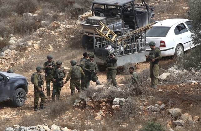 October 6, 2026, Aqraba, Palestine, State of: AQRABA, OCCUPIED WEST BANK, OCTOBER 6, 2026: Palestinian farmers come under attack by Israeli settlers while harvesting olives in the village of Aqraba, south of Nablus. Several Palestinians were wounded after settlers opened fire and assaulted farmers during the harvest, according to Palestinian reports. Israeli forces later detained a Palestinian farmer at the scene, according to information provided by the photographer. The Israeli military had not immediately commented on the reported shooting. Aqraba Palestine, State of - ZUMAq101 20261006_zna_q101_072 Copyright: xNedalxShtiehx