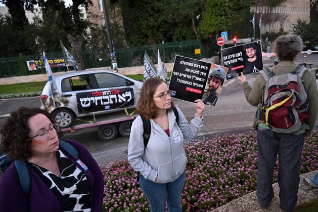 A car burned by Hamas terrorists is displayed at a protest of families and supporters of Israelis murdered by Hamas, on the third anniversary, of the deadliest day in Israel s history outside the Israeli Knesset, Parliament, in Jerusalem, on Wednesday, October 7, 2026. Demonstrators demand a state independent inquiry into the government s security failures, a request rejected by Israeli Prime Minister Benjamin Netanyahu. The banner reads The people shall remember their sons and daughters who were murdered a reference to the Yizkor prayer, with the date 27 10, the day of the upcoming general elections in Israel that are seen as a referendum on Netanyahu s power. JER2026100715 DEBBIExHILL