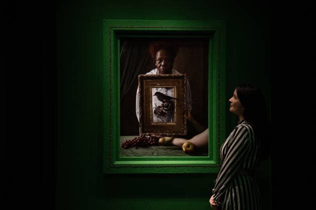 Tim Walker s Fairyland: Love and Legends Photo Call at National Portrait Gallery, London, UK - 7 October 2026 A staff member views Olivette Cole-Wilson, and blackbird by Tim Walker as part of The National Portrait Gallery s Tim Walker s Fairyland: Love and Legends Exhibition which runs from 9th October 2026 - 7th February 2027 at National Portrait Gallery in London, England, UK on Wednesday 7 October, 2026., Credit:Justin Ng Avalon UK, England, London, National Portrait Gallery Copyright: xJustinxNgx xAvalonx 1141202413