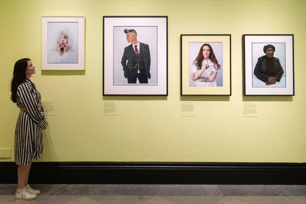 Tim Walker s Fairyland: Love and Legends Photo Call at National Portrait Gallery, London, UK - 7 October 2026 A staff member views (L-R) - Shon Faye , Joelle Taylor , Alice Oseman , Lady Phill all by Tim Walker as part of The National Portrait Gallery s Tim Walker s Fairyland: Love and Legends Exhibition which runs from 9th October 2026 - 7th February 2027 at National Portrait Gallery in London, England, UK on Wednesday 7 October, 2026., Credit:Justin Ng Avalon UK, England, London, National Portrait Gallery Copyright: xJustinxNgx xAvalonx 1141202420