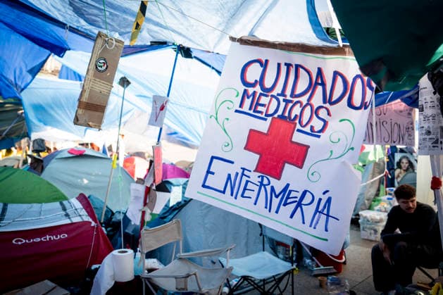 Protesters at Sol Square maintain their demands regarding housing. A banner reading Medical care, nursing during the housing protest at Puerta del Sol on October 8, 2026, in Madrid, Spain. The encampment at Sol has spilled over into the square, and the protesters are maintaining their demands against evictions and exorbitant rents. The Official State Gazette (BOE) published yesterday, October 7, the new version of the housing and rent decrees that the Council of Ministers had approved the previous day OCTOBER 8, 2026 A Pé Madrid, Madrid, Spain Copyright: xA.xPÃ rezxMecax 7828163