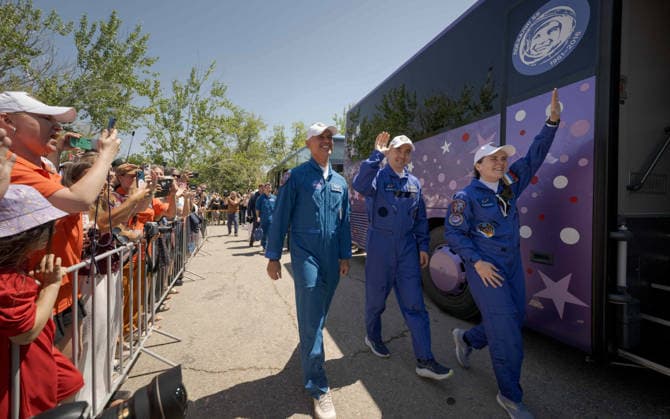 October 8, 2026, Baikonur, Kazakhstan: Baikonur, Kazakhstan. 14 July, 2026. NASA astronaut Anil Menon, left, and Roscosmos cosmonauts Pyotr Dubrov and Anna Kikina walk out of the Cosmonaut Hotel to suit up for their Soyuz launch, July 14, 2026 in Baikonur, Kazakhstan. The crew launched later that day to the International Space Station. Baikonur Kazakhstan - ZUMAp138 20261008_zaa_p138_010 Copyright: xBillxIngalls Nasax