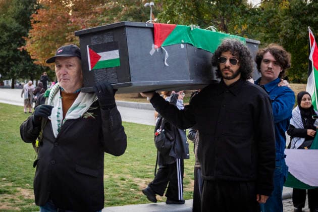 Pro-Palestine Silent Funeral Procession Central London, October 8, 2026 A pro-Palestine silent funeral procession took place in Central London, with demonstrators walking in silence to remember Palestinians killed in the conflict in Gaza. Participants carried Palestinian flags and placards, while some held a coffin and others carried effigies wrapped in burial shrouds, symbolising those killed in the conflict., Credit:Zak Irfan Avalon Copyright: xZakxIrfanx xAvalonx 1141557244