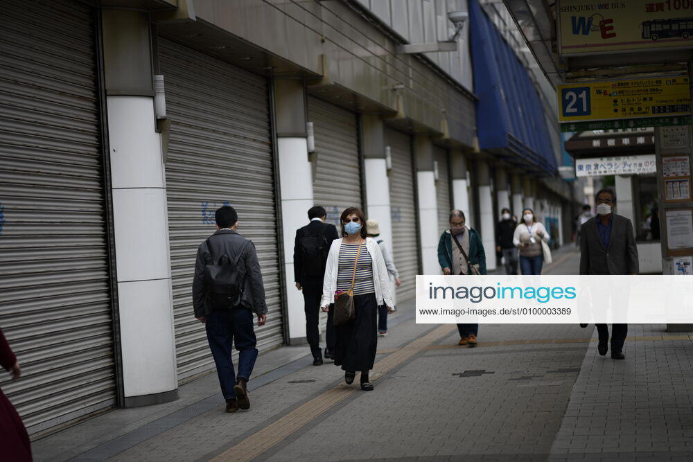 Commuters wearing face mask head to work early morning during a rush hour in Tokyo amid concerns of the COVID-19 coronavirus on Monday, April 27, 2020. Japanese Prime Minister Shinzo Abe declared a nationwide State of Emergency last week urging people to stay home to prevent the spreading of the coronavirus throughout the country. (Photo: Richard Atrero de Guzman AFLO) (125743427)