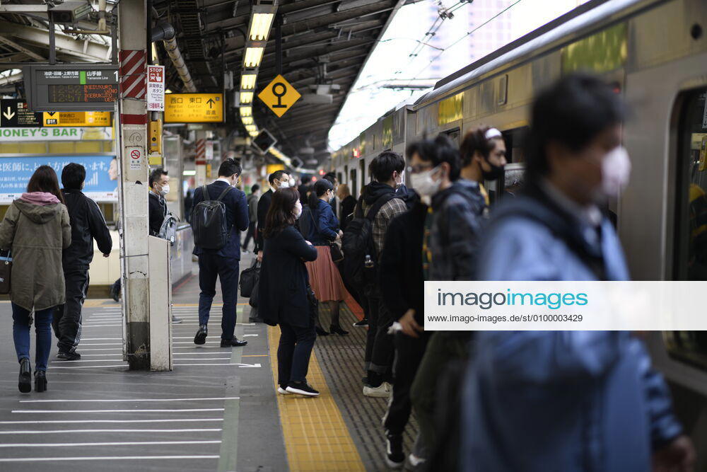Commuters wearing face mask head to work early morning during a rush hour in Tokyo amid concerns of the COVID-19 coronavirus on Monday, April 27, 2020. Japanese Prime Minister Shinzo Abe declared a nationwide State of Emergency last week urging people to stay home to prevent the spreading of the coronavirus throughout the country. (Photo: Richard Atrero de Guzman AFLO) (125743500)