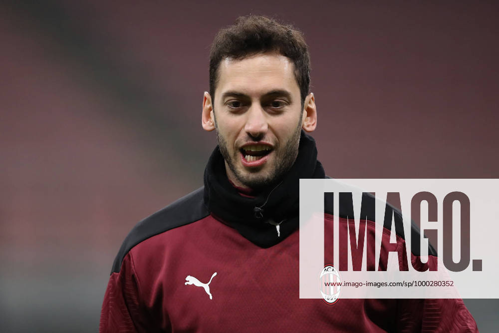 Hakan Calhanoglu of AC Milan during the warm up prior to the Coppa Italia match at Giuseppe Meazza, Milan. Picture date: 12th January 2021. Picture credit should read: Jonathan Moscrop Sportimage . SPI-0842-0072