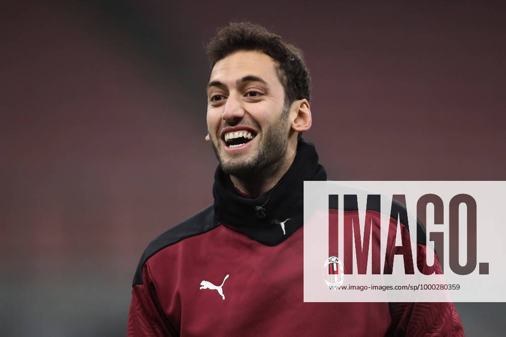 Hakan Calhanoglu of AC Milan during the warm up prior to the Coppa Italia match at Giuseppe Meazza, Milan. Picture date: 12th January 2021. Picture credit should read: Jonathan Moscrop Sportimage . SPI-0842-0079