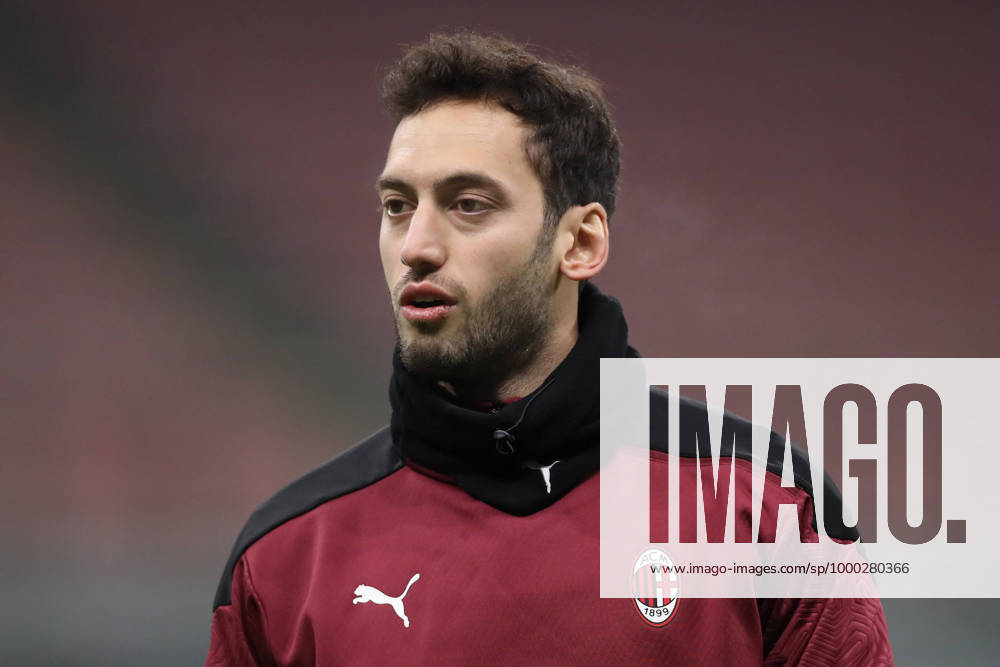 Hakan Calhanoglu of AC Milan during the warm up prior to the Coppa Italia match at Giuseppe Meazza, Milan. Picture date: 12th January 2021. Picture credit should read: Jonathan Moscrop Sportimage . SPI-0842-0085