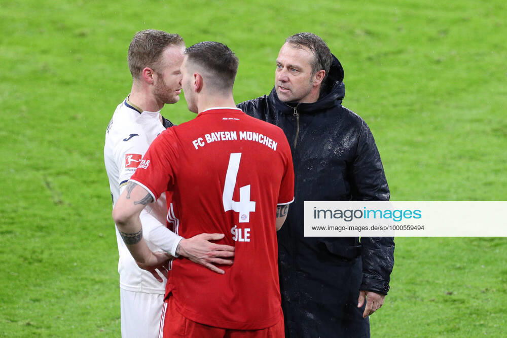 FC Bayern Muenchen vs. TSG 1899 Hoffenheim, 1. Bundesliga, 19. Spieltag, 30.01.2021 l-r: Kevin Vogt 22 (TSG 1899 Hoffenheim), Niklas Suele 4 (FC Bayern Muenchen), Chef-Trainer Hansi Flick (FC Bayern Muenchen) nach Spielende, FC Bayern Muenchen vs. TSG 1899 Hoffenheim, 1. Bundesliga, 19. Spieltag, 30.01.2021, Foto: Christian Kolbert kolbert-press Pool - Editorial Use ONLY - DFL regulations prohibit any use of photographs as image sequences and or quasi-video - National and International News Agencies OUT München Allianz Arena Bayern Deutschland