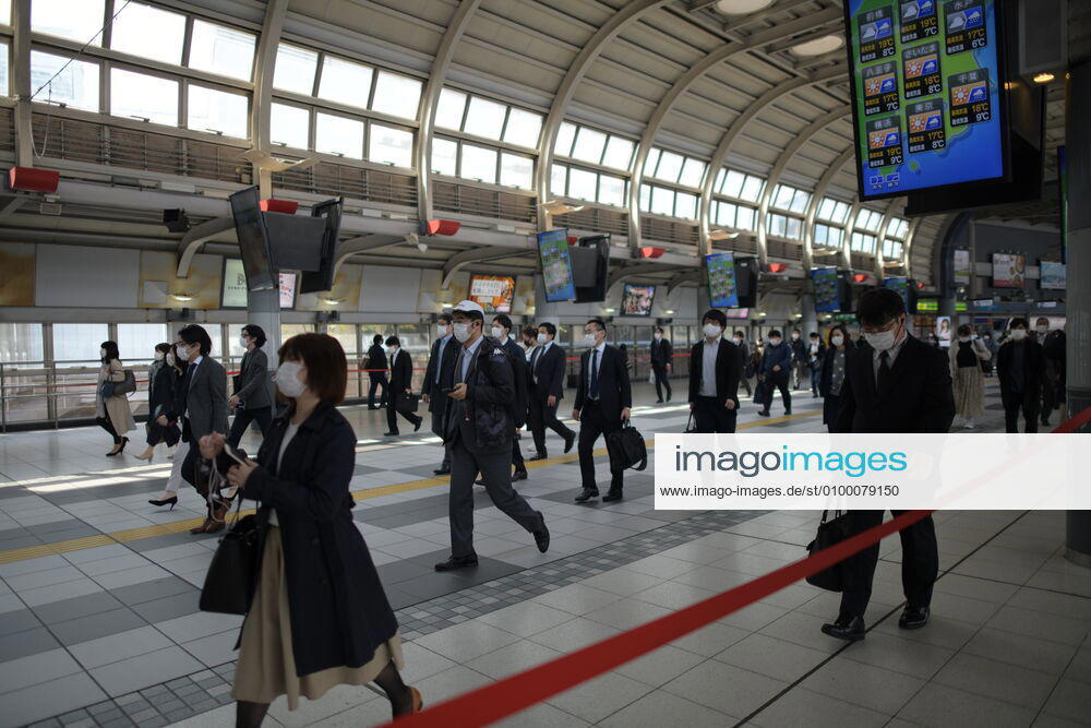 Commuters wearing face mask head to work during a rush hour in Tokyo amid concerns of the COVID-19 coronavirus outbreak on Tuesday, April 28, 2020. Japanese Prime Minister Shinzo Abe declared a nationwide State of Emergency last week urging people to stay home to prevent the spread of the coronavirus throughout the country. (Photo: Richard Atrero de Guzman AFLO) (125774062)