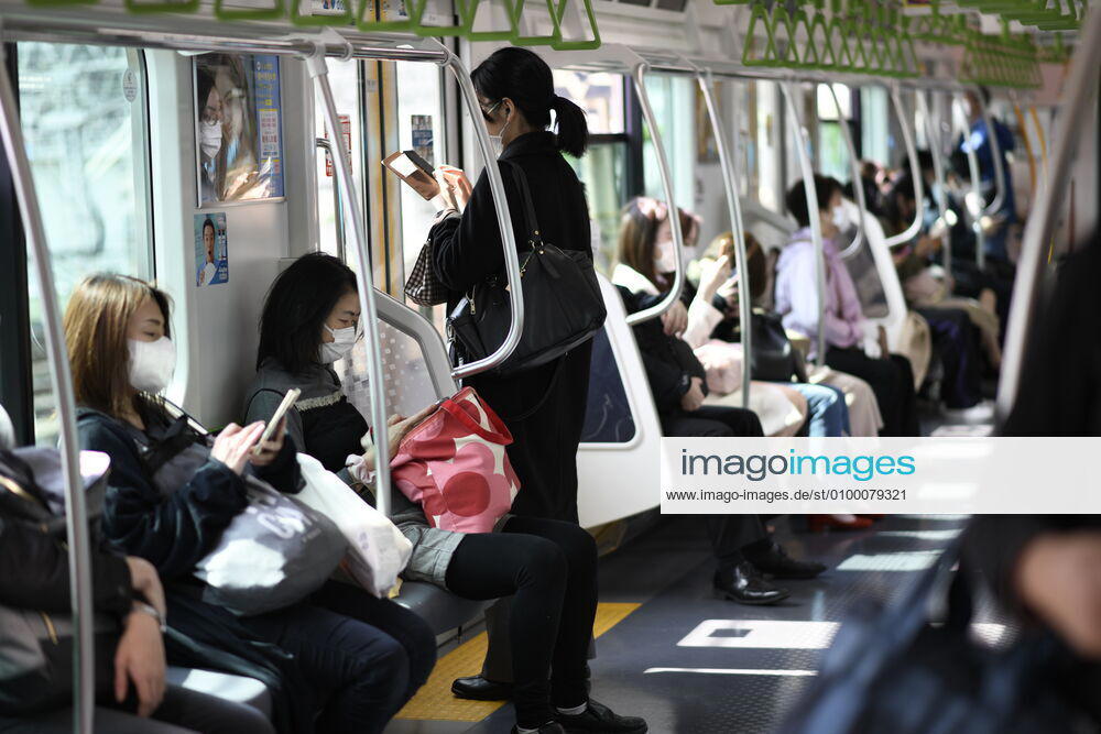 Commuters wearing face mask head to work during a rush hour in Tokyo amid concerns of the COVID-19 coronavirus outbreak on Tuesday, April 28, 2020. Japanese Prime Minister Shinzo Abe declared a nationwide State of Emergency last week urging people to stay home to prevent the spread of the coronavirus throughout the country. (Photo: Richard Atrero de Guzman AFLO) (125774077)