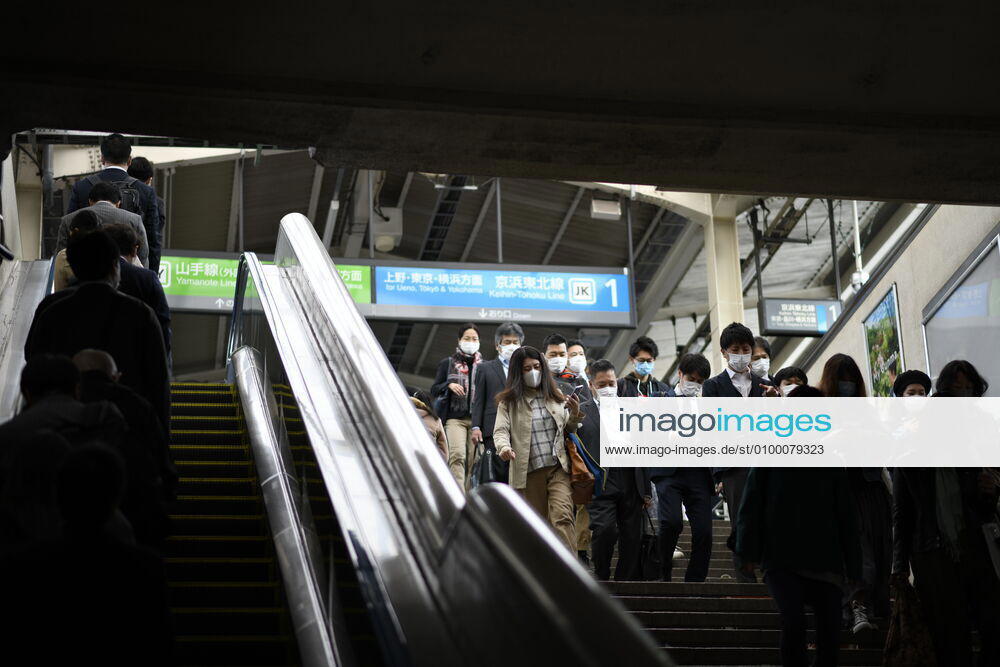 Commuters wearing face mask head to work during a rush hour in Tokyo amid concerns of the COVID-19 coronavirus outbreak on Tuesday, April 28, 2020. Japanese Prime Minister Shinzo Abe declared a nationwide State of Emergency last week urging people to stay home to prevent the spread of the coronavirus throughout the country. (Photo: Richard Atrero de Guzman AFLO) (125774078)