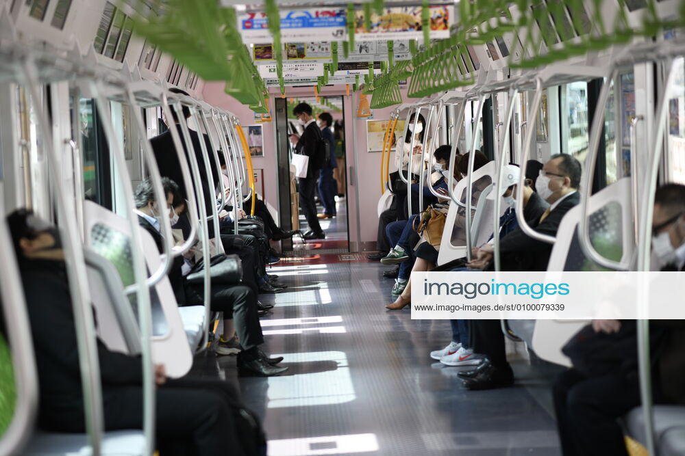 Commuters wearing face mask head to work during a rush hour in Tokyo amid concerns of the COVID-19 coronavirus outbreak on Tuesday, April 28, 2020. Japanese Prime Minister Shinzo Abe declared a nationwide State of Emergency last week urging people to stay home to prevent the spread of the coronavirus throughout the country. (Photo: Richard Atrero de Guzman AFLO) (125774080)