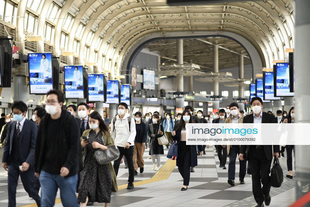 Commuters wearing face mask head to work during a rush hour in Tokyo amid concerns of the COVID-19 coronavirus outbreak on Tuesday, April 28, 2020. Japanese Prime Minister Shinzo Abe declared a nationwide State of Emergency last week urging people to stay home to prevent the spread of the coronavirus throughout the country. (Photo: Richard Atrero de Guzman AFLO) (125774085)