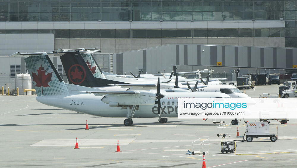 (200427) -- TORONTO, April 27, 2020 -- Planes of Air Canada are seen at Pearson International Airport in Toronto, Canada, April 27, 2020. Air Canada suspended all scheduled flights to the United States for four weeks starting on Monday. As of Monday afternoon, there were 48,230 confirmed COVID-19 cases in Canada and 2,701 deaths. (Photo by Xinhua) CANADA-TORONTO-COVID-19-AIR CANADA-FLIGHTS TO U.S.-SUSPENSION ZouxZheng