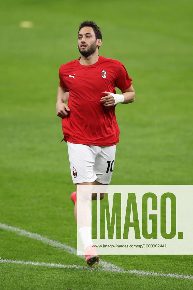 Hakan Calhanoglu of AC Milan during the warm up prior to the UEFA Europa League match at Giuseppe Meazza, Milan. Picture date: 25th February 2021. Picture credit should read: Jonathan Moscrop Sportimage . SPI-0923-0099