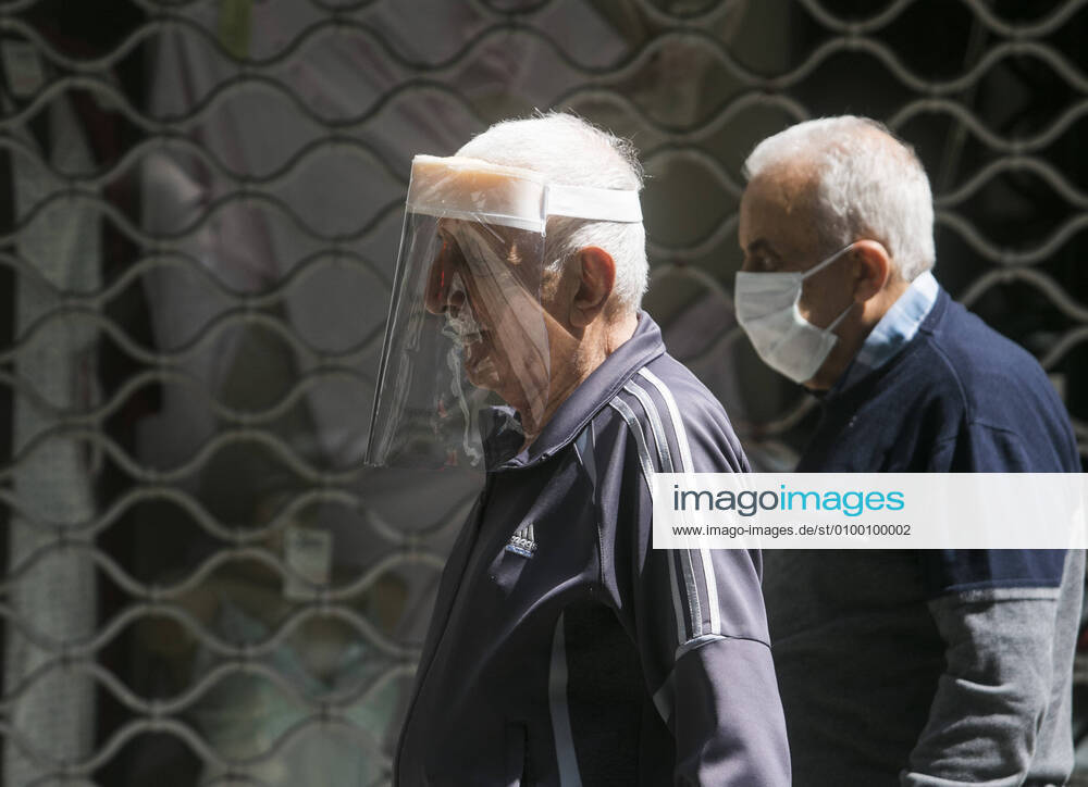 Pedestrians wearing protective face shields amid the ongoing covid-19 pandemic. Lebanon s cabinet has extended the lockdown measures until the 10th May as the country faces a deepening economic crisis and growing protests over worsening living standards. Where: Beirut, Lebanon When: 28 Apr 2020 Credit: Amer Ghazzal Cover Images