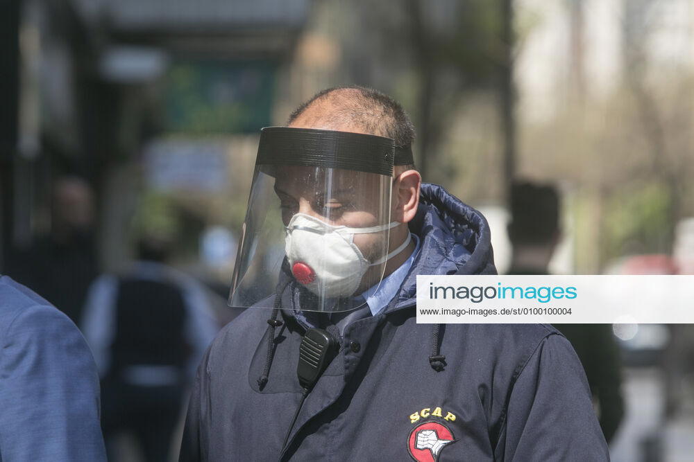 A security guard in Beirut stands outside a bank wearing a protective surgical mask and a face shield amid the ongoing covid-19 pandemic. Lebanon s cabinet has extended the lockdown measures until the 10th May as the country faces a deepening economic crisis and growing protests over worsening living standards. Where: Beirut, Lebanon When: 28 Apr 2020 Credit: Amer Ghazzal Cover Images