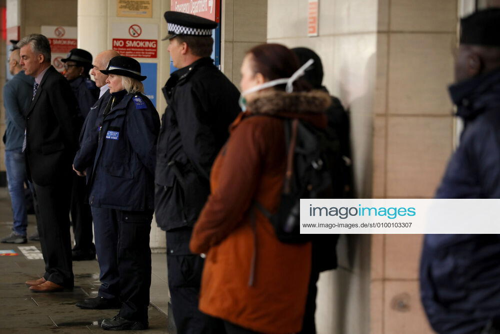 (200428) -- LONDON, April 28, 2020 (Xinhua) -- People take part in one minute s silence outside Chelsea and Westminster Hospital in London, Britain on April 28, 2020. One minute s silence was held across Britain Tuesday morning to commemorate the key workers who have died during the novel coronavirus outbreak. (Photo by Tim Ireland Xinhua) BRITAIN-LONDON-COVID-19-COMMEMORATION