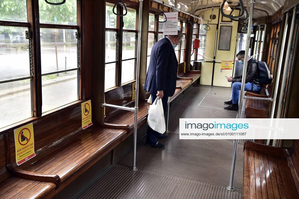 Milan, Coronavirus new signage for phase 2, respecting the sea distances inside the trams that in the stops, Advertising on Trams, public transport Atm (Duilio Piaggesi Fotogramma, Milan - 2020-04-28) p.s. la foto e utilizzabile nel rispetto del contesto in cui e stata scattata, e senza intento diffamatorio del decoro delle persone rappresentate