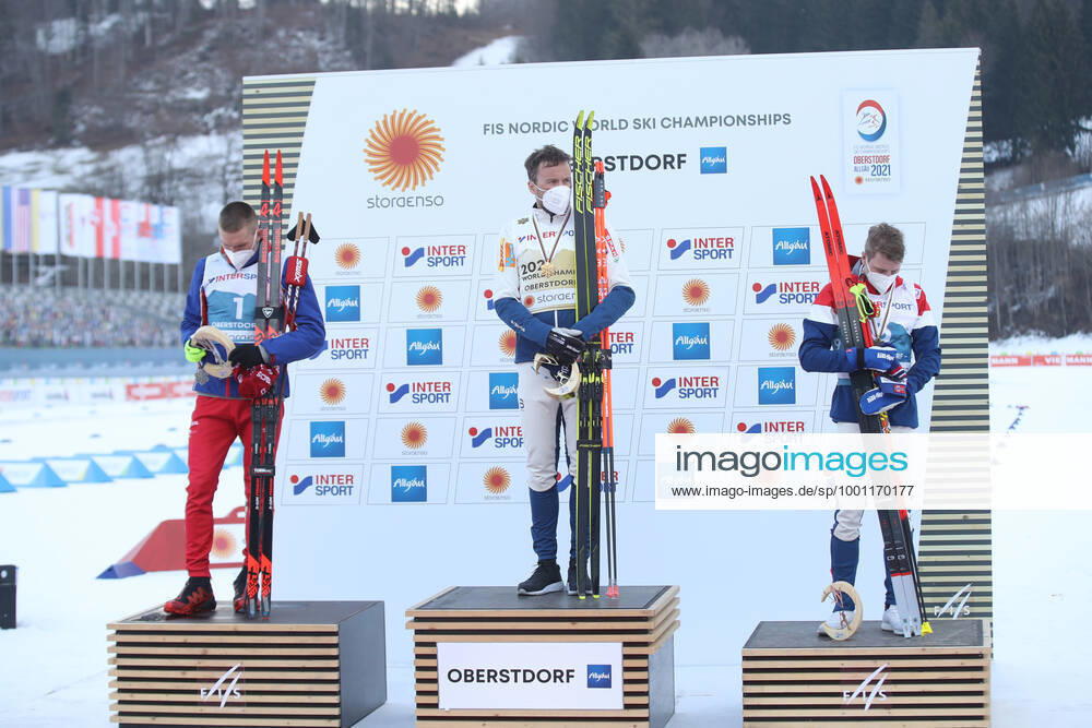 NORDIC SKIING - FIS Nordic World Ski Championships Oberstdorf 2021 OBERSTDORF,GERMANY,07.MAR.21 - NORDIC SKIING, CROSS COUNTRY SKIING - FIS Nordic World Ski Championships, 50km classic, men, award ceremony. Image shows Alexander Bolshunov (RUS), Emil Iversen and Simen Hegstad Krueger (NOR). keywords: medal. GEPAxpictures xChristianxWalgram