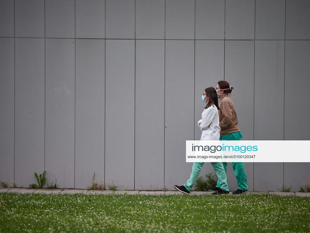 Several health workers walk through the Hospital Complex of Navarra during a Covid-19 Pandemic on April 28, 2020 in Pamplona, Navarra, Spain Pamplona SPAIN - ZUMAa181 20200428_zaa_a181_050