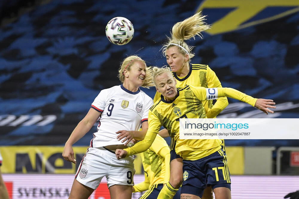(L-R) Lindsey Horan of USA, Caroline Seger and Linda Sembrant of Sweden in action during a friendly international soccer match between Sweden and USA at Friends Arena in Stockholm, Sweden, on Saturday April 10, 2021. Photo Janerik Henriksson TT kod 10010 *SWEDEN OUT* STOCKHOLM SWEDEN SOCCER