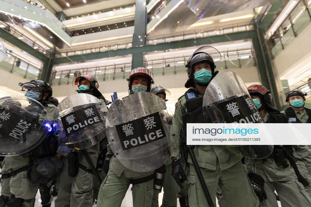 Riot police wearing a face mask, as a precautionary measure against the COVID-19 coronavirus seen inside New Town Plaza shopping mall in the Shatin district of Hong Kong, China, on Friday, May 1, 2020. The social-distancing restrictions during the outbreak of Covid-19 over the past few months, has largely suppressed pro-democracy protests that rocked the Asian financial hub last year. However, with virus cases ease, activists have begun organising new demonstrations, defying the measures. Hong Kong China - ZUMAj323 20200501_zip_j323_002