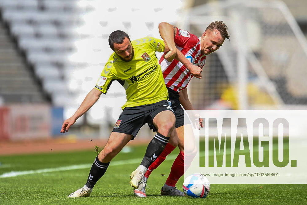 Sunderland v Northampton Town EFL Sky Bet League 1 09 05 2021. Jack Diamond ( 21) of Sunderland AFC pulls back Michael Harriman ( 2) of Northampton Town FC during the EFL Sky Bet League 1 match between Sunderland AFC and Northampton Town at the Stadium Of Light, Sunderland, England on 9 May 2021. Editorial use only DataCo restrictions apply See www.football-dataco.com ,