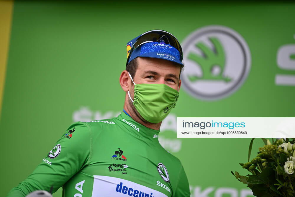 British Mark Cavendish of Deceuninck - Quick-Step celebrates on the podium in the green jersey of leader in the sprint ranking after the fifth stage of the 108th edition of the Tour de France cycling race, a 27,2km individual time trial from Change to Laval Espace Mayenne, France, Wednesday 30 June 2021. This year s Tour de France takes place from 26 June to 18 July 2021. DAVIDxSTOCKMAN x3023874x