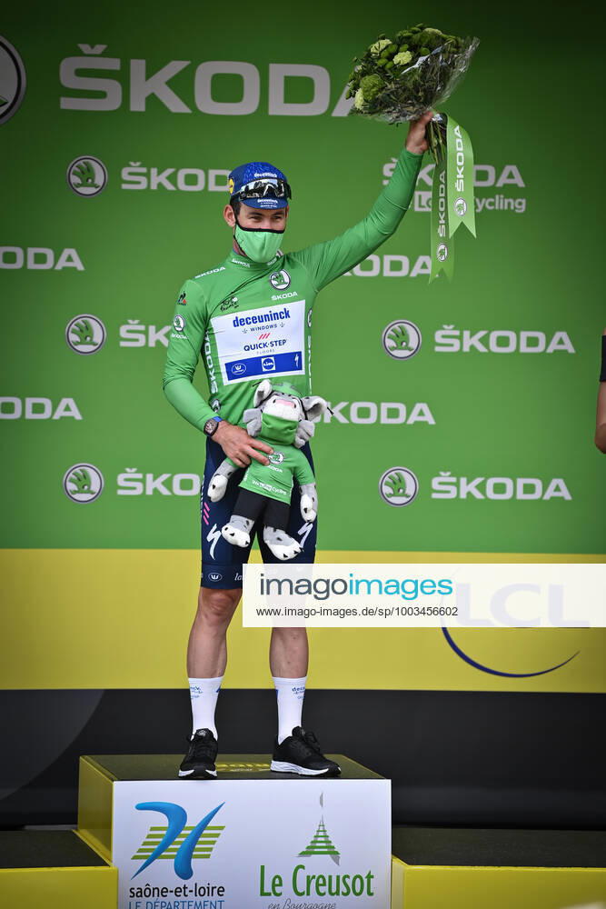 British Mark Cavendish of Deceuninck - Quick-Step celebrates on the podium in the green jersey of leader in the sprint ranking after the seventh stage of the 108th edition of the Tour de France cycling race, 249,1km from Vierzon to Le Creusot, France, Friday 02 July 2021. This year s Tour de France takes place from 26 June to 18 July 2021. DAVIDxSTOCKMAN x3025551x