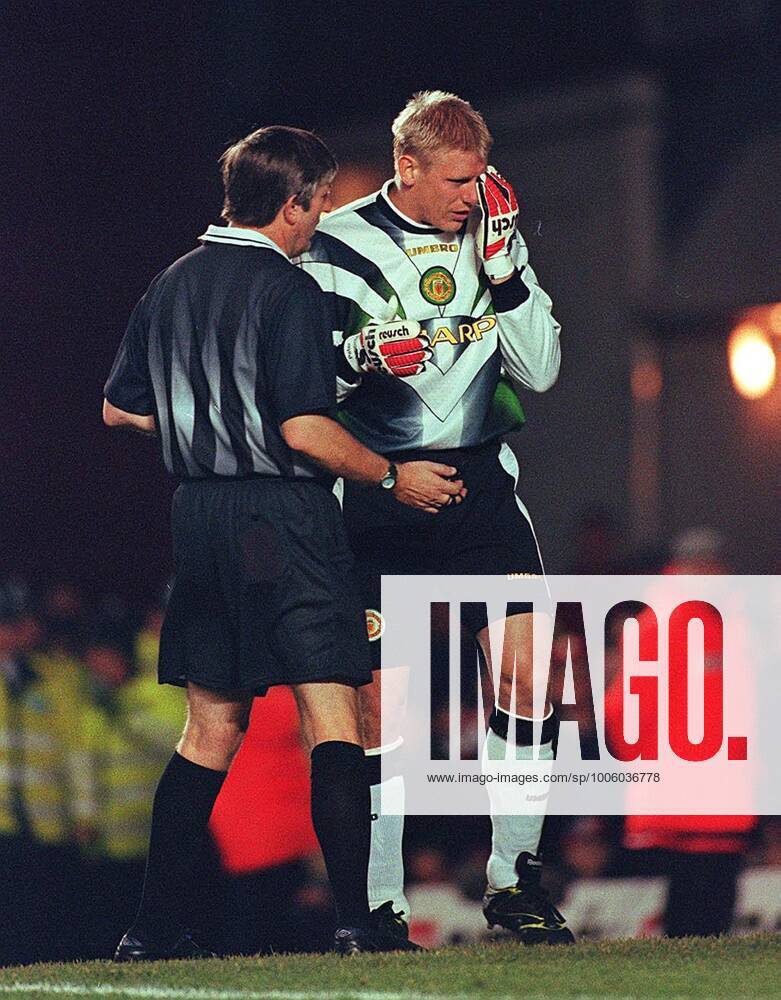 Mandatory Credit: Photo by Ted Blackbrow Daily Mail Shutterstock (2052584a) Arsenal V Manchester Utd. Premier League. Ref Talks To Peter Schmiechel After He Was Hit By A Flying Coin. Arsenal Won 3-2. Arsenal V Manchester Utd. Premier League. Ref Talks To Peter Schmiechel After He Was Hit By A Flying Coin. Arsenal Won 3-2. No use with unauthorised audio, video, data, fixture lists (outside the EU), club league logos or live services. Online in-match use limited to 45 images (+15 in extra time). No use to emulate moving images. No use in betting, games or single club league player publications services. Arsenal V Manchester Utd. Premier League. Ref Talks To Peter Schmiechel After He Was Hit By A Flying Coin. Arsenal Won 3-2. No use with unauthorised audio, video, data, fixture lists (outside the EU), club league logos or live services. Online in-match use limited to 45 images (+15 in extra time). No use to emulate moving images. No use in betting, games or