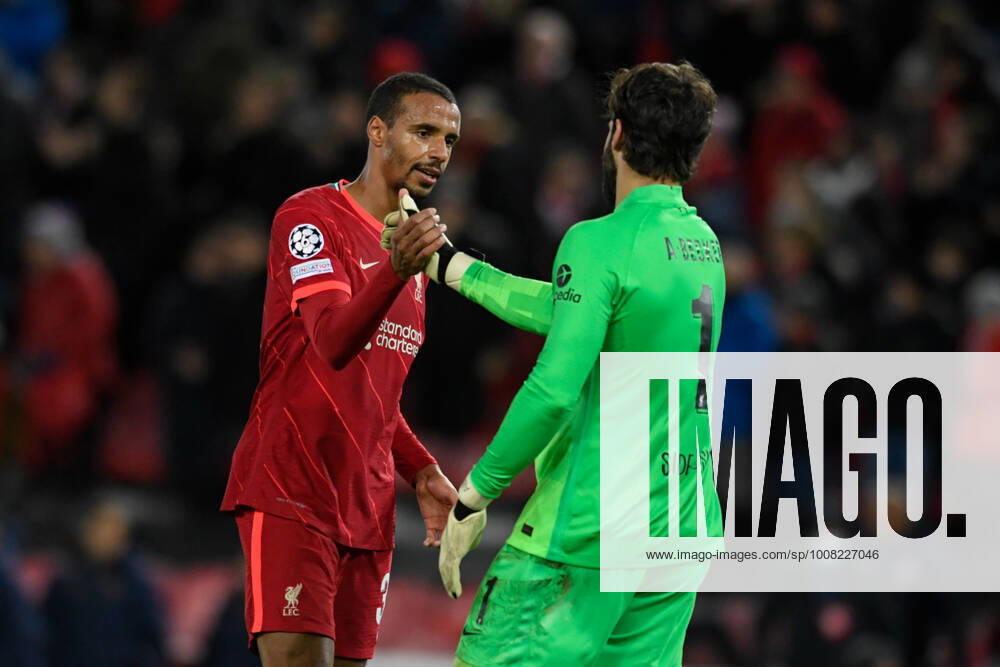 UEFA Champions League Liverpool v FC Porto Joel Matip 32 of Liverpool celebrates beating FC Porto 2-0 with Alisson Becker 1 of Liverpool Liverpool Anfield Merseyside United Kingdom