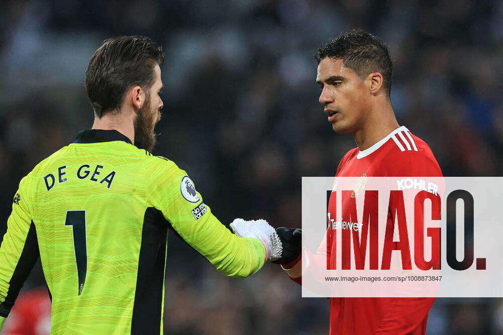 Premier League Newcastle United v Manchester United, ManU David De Gea 1 of Manchester United and team mate Raphaël Varane 19 bump fists at the end of the game