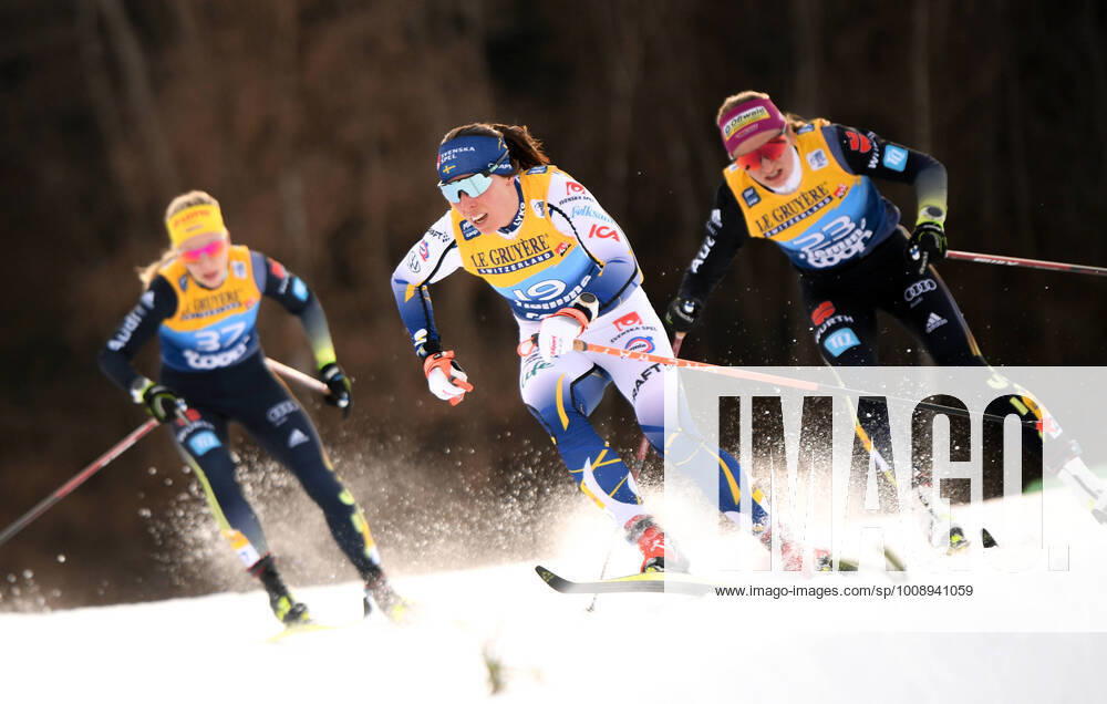KW01 Italy Cross Country Skiing Tour de Ski Women 6735697 03.01.2022 From left, Germany s Lisa Lohmann, Sweden s Charlotte Kalla and Germany s Katherine Sauerbrey compete in the women s mass start classic race at the Tour de Ski cross-country skiing event in Val di Fiemme, Italy. Alexey Filippov Sputnik Val di Fiemme Italy
