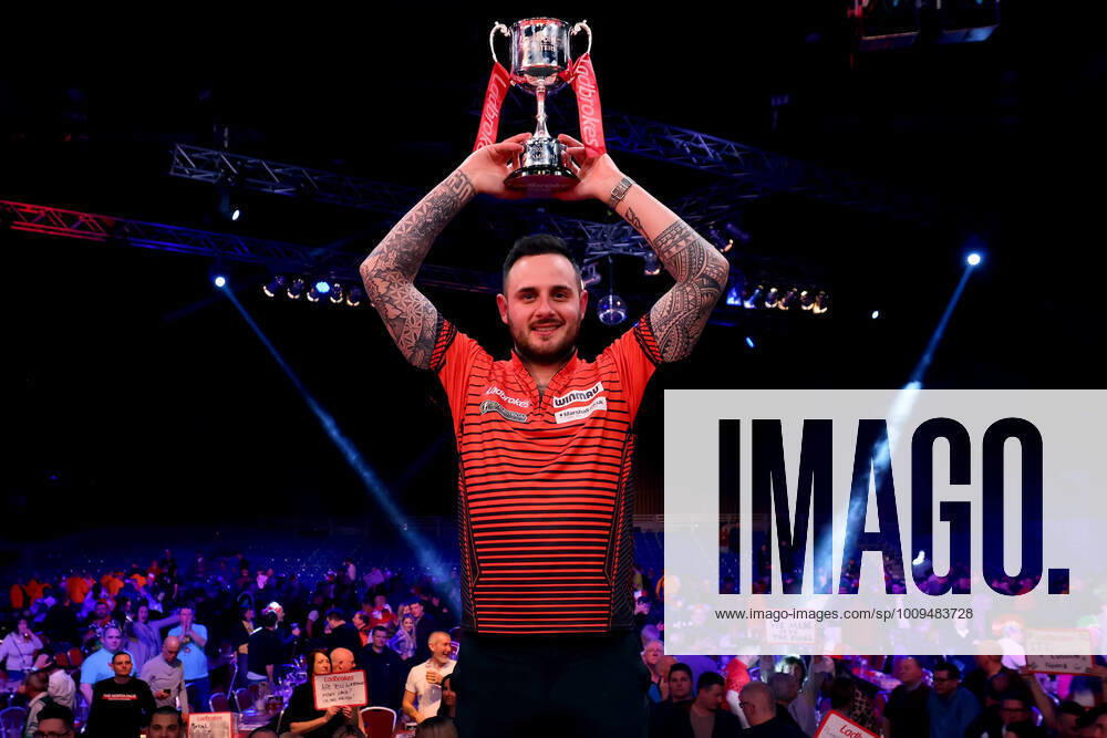 KW04 30th January 2022; Marshall Arena, Milton Keynes, Bucks, England: Ladbrokes Masters Darts Tournament: Joe Cullen celebrates with the Ladbrokes Masters trophy ActionPlus12360335 ShaunxBrooks