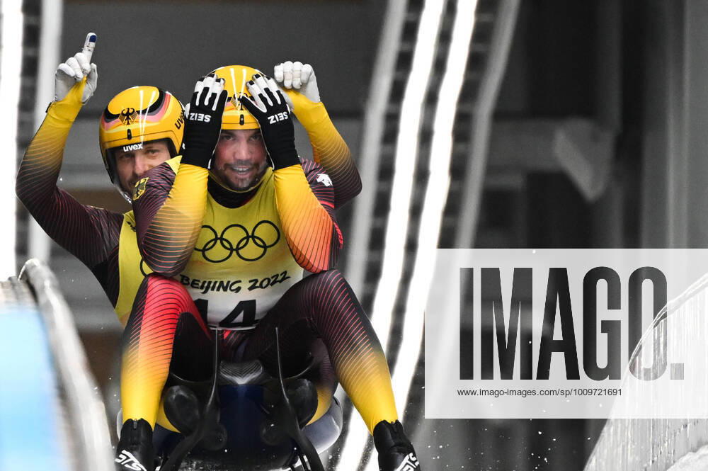 KW06 China Olympics 2022 Luge Team Relay 8110775 10.02.2022 Germany s Tobias Wendl and Tobias Arlt cheer at the finish line in the luge team relay competition during the Beijing 2022 Winter Olympic Games, Olympische Spiele, Olympia, OS at the National Sliding Centre in Yanqing, China. Vladimir Astapkovich Sputnik Beijing China