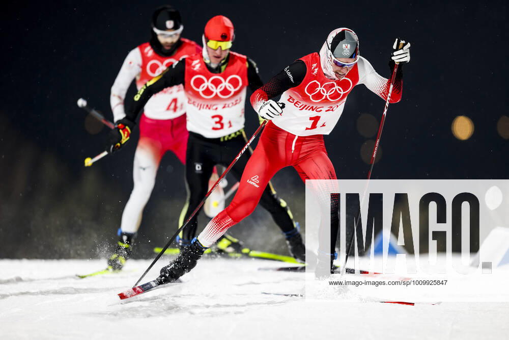 OLYMPICS - Winter Olympic Games, Olympische Spiele, Olympia, OS Beijing 2022 ZHANGJIAKOU,CHINA,17.FEB.22 - OLYMPICS, NORDIC SKIING, NORDIC COMBINED, CROSS COUNTRY - Winter Olympic Games Beijing 2022, 4x5km, team event. Image shows Yoshito Watabe (JPN), Manuel Faisst (GER) and Franz-Josef Rehrl (AUT). GEPAxpictures xPatrickxSteiner