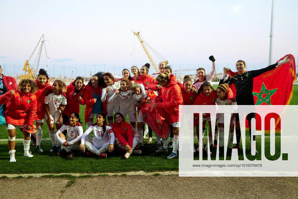 Morocco womens national soccer team players and officials celebrate winning the VisitMalta Women s International Trophy 2022 tournament after beating Moldova 4-0 in the final soccer match between Morocco and Moldova at the Tony Bezzina Stadium, Paola, Malta on 22 February 2022. Morocco v Moldova Womens VMW_22