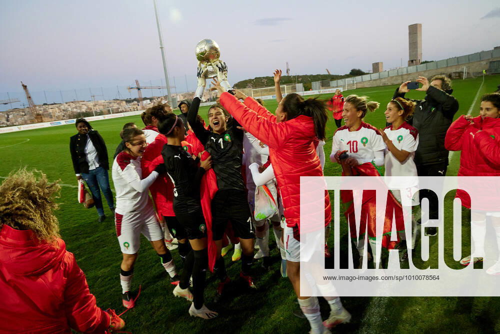 Morocco womens national soccer team players and officials celebrate winning the VisitMalta Women s International Trophy 2022 tournament after beating Moldova 4-0 in the final soccer match between Morocco and Moldova at the Tony Bezzina Stadium, Paola, Malta on 22 February 2022. Morocco v Moldova Womens VMW_22