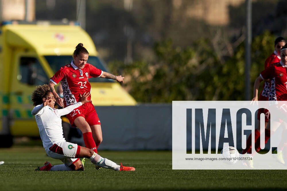 Morocco womens national soccer team player Sanaa Mssoudy (L) goes in with her challenge on Irina Topal (R) of Moldova during the VisitMalta Women s International Trophy 2022 tournament soccer match between Morocco and Moldova at the Tony Bezzina Stadium, Paola, Malta on 22 February 2022. Morocco beat Moldova 4-0 to win the tournament. Morocco v Moldova Womens VMW_22