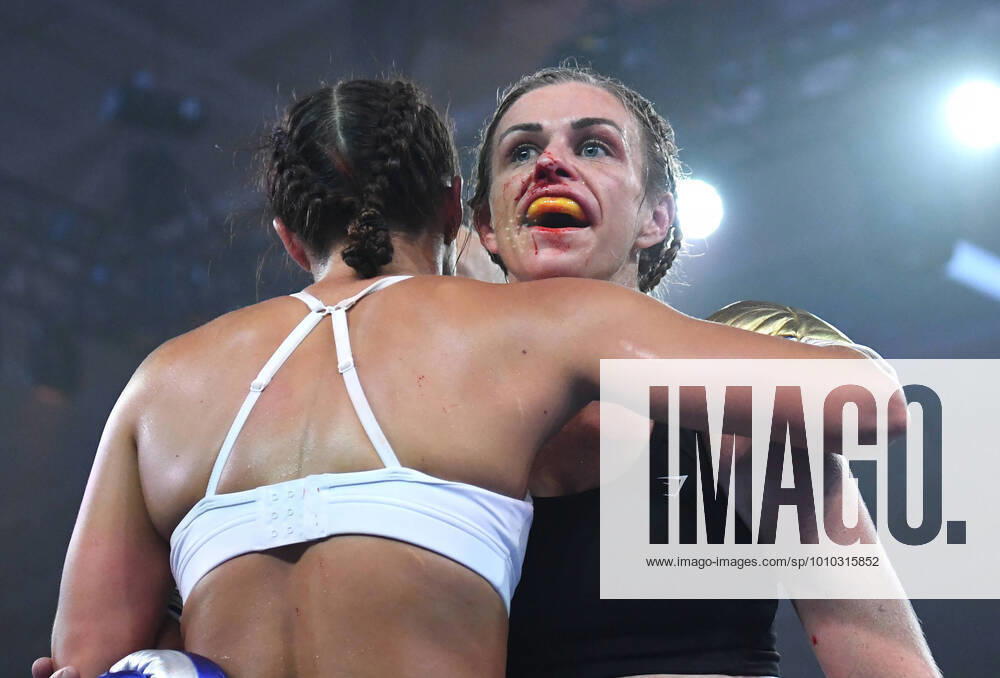 KW09 BOXING TSZYU STAHL, Ali Jensen (right) is embraced by her opponent Linn Sandstrom (left) after their fight on the undercard of the Super-Welterweight bout between Nikita Tszyu and Aaron Stahl at the Nissan Arena in Brisbane, Thursday, March 3, 2022. ( NO ARCHIVING, , NO USE IN BOOKS WITHOUT CONSENT BRISBANE QLD AUSTRALIA