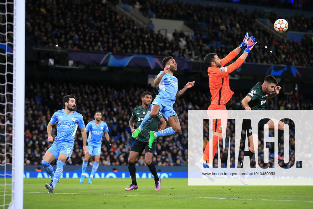 Football - UEFA Champions League - Round of 16 (2nd Leg) - Manchester City v Sporting CP 9th March 2022 - UEFA Champions League - Round of 16 (2nd Leg) - Manchester City v Sporting CP - Sporting CP goalkeeper Antonio Adan catches the ball ahead of Raheem Sterling of Manchester City - Photo: Simon Stacpoole Offside. Manchester UK
