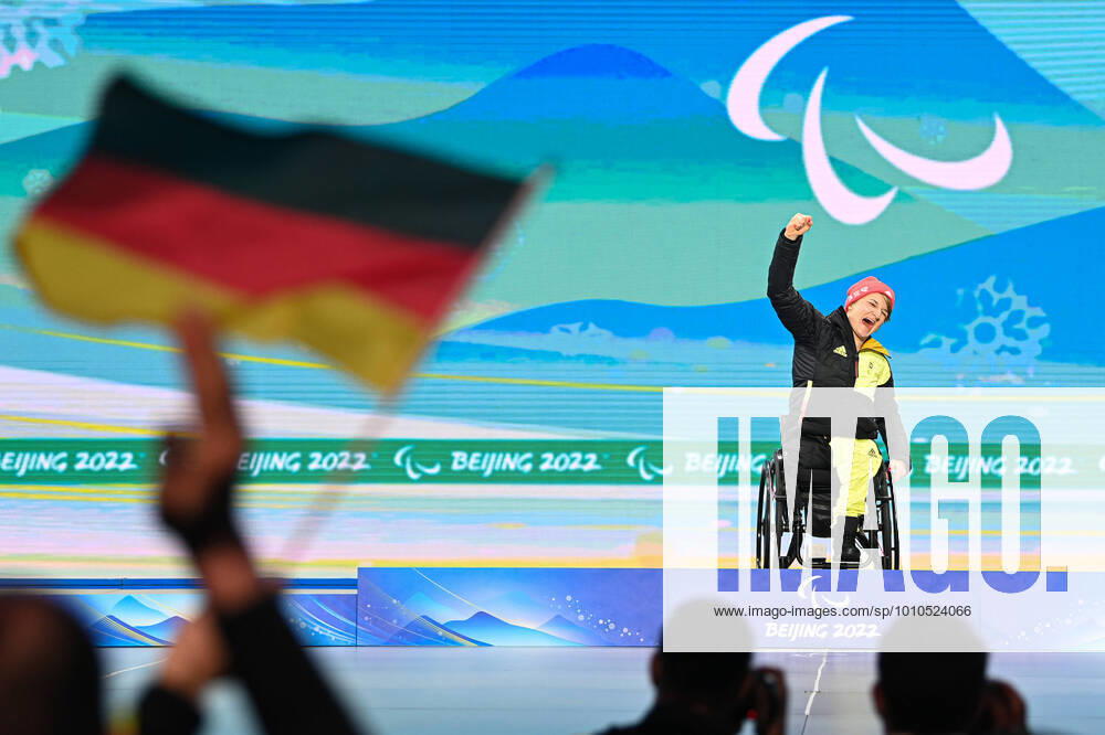 KW10 (220312) -- BEIJING, March 12, 2022 -- Gold medalist Anna-Lena Forster of Germany celebrates during the awarding ceremony for the Para Alpine Skiing Women s Slalom Sitting event of Beijing 2022 Winter Paralympic Games at Yanqing Medals Plaza in Yanqing District, Beijing, capital of China, March 12, 2022. ) (SP)CHINA-BEIJING-WINTER PARALYMPICS-PARA ALPINE SKIING-WOMEN S SLALOM SITTING-VICTORY CEREMONY(CN) JiangxHan