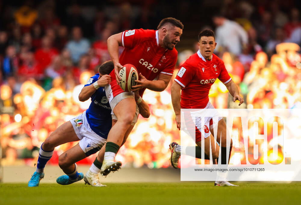 19th March 2022 ; Principality Stadium, Cardiff, Wales: 6 Nations international rugby, Wales versus Italy; Gareth Thomas of Wales is tackled by Leonardo Marin of Italy ActionPlus12371885 PaulxJenkins Content restricted for UK based newspaper
